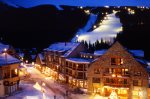The village comes alive at night during winter with night skiing